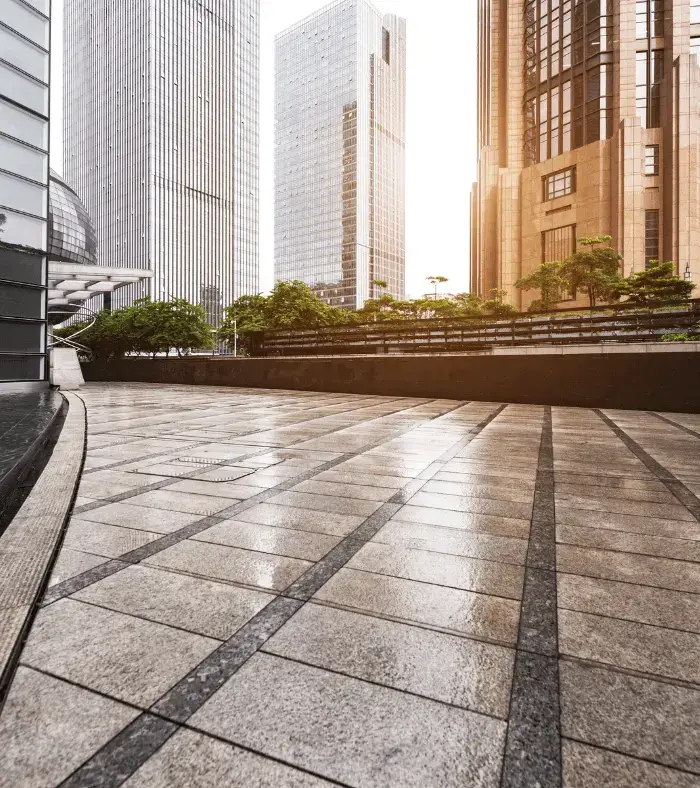 Polished commercial concrete pavement in a modern city business district